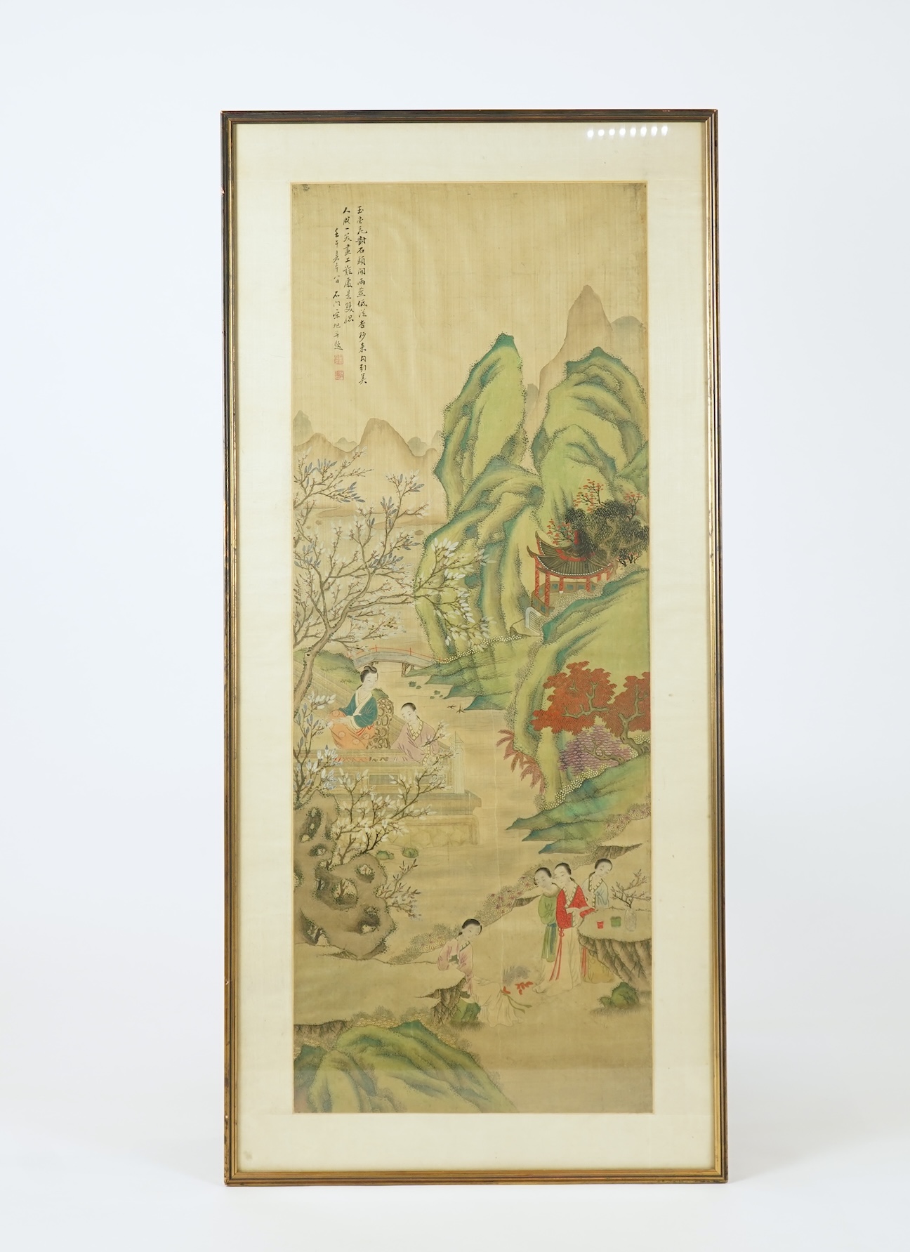 Chinese School , (late 19th century), Ladies in a garden, Ink and colour on silk, 107cm x 41cm, excluding brocade border